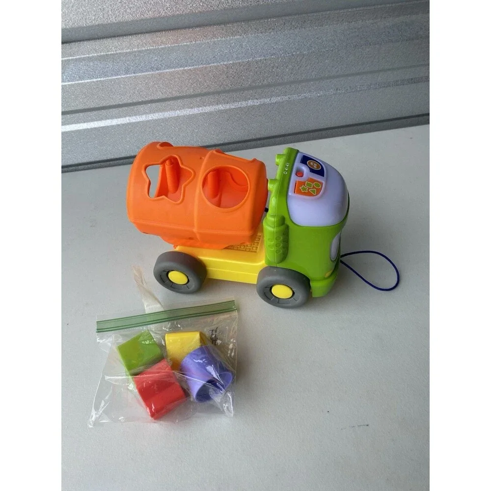 Fisher-Price Sort & Spill Learning Dump Truck Musical Shape Sorter